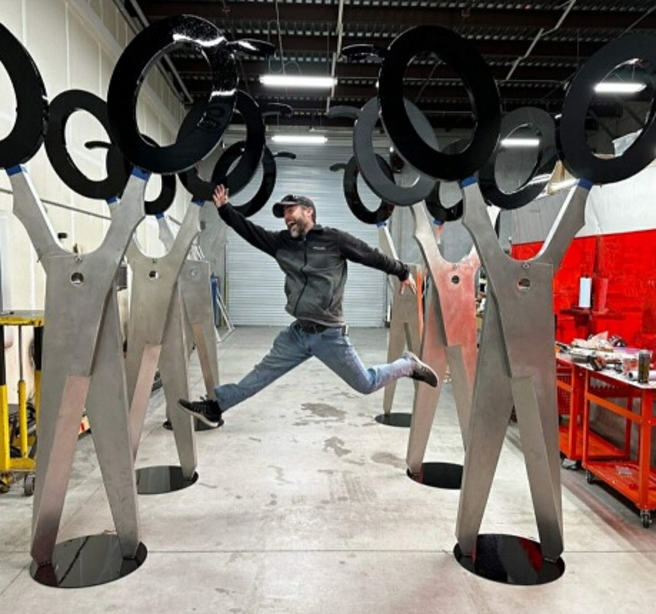 Oversized scissors art sculptures are on display at Salon and Spa Galleria locations in the Dallas-Fort Worth area.